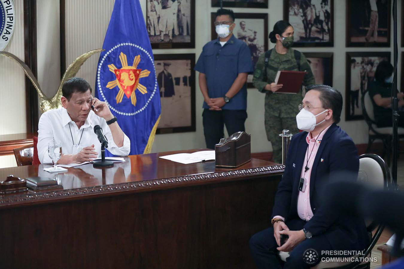 President Rodrigo Roa Duterte talks on the phone with Socialist Republic of Vietnam Prime Minister Nguyen Phuc at the Malago Clubhouse in Malacañang, Manila on May 26, 2020. TOTO LOZANO/PRESIDENTIAL PHOTO