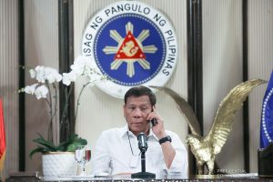 President Rodrigo Roa Duterte talks on the phone with Socialist Republic of Vietnam Prime Minister Nguyen Phuc at the Malago Clubhouse in Malacañang, Manila on May 26, 2020. TOTO LOZANO/PRESIDENTIAL PHOTO