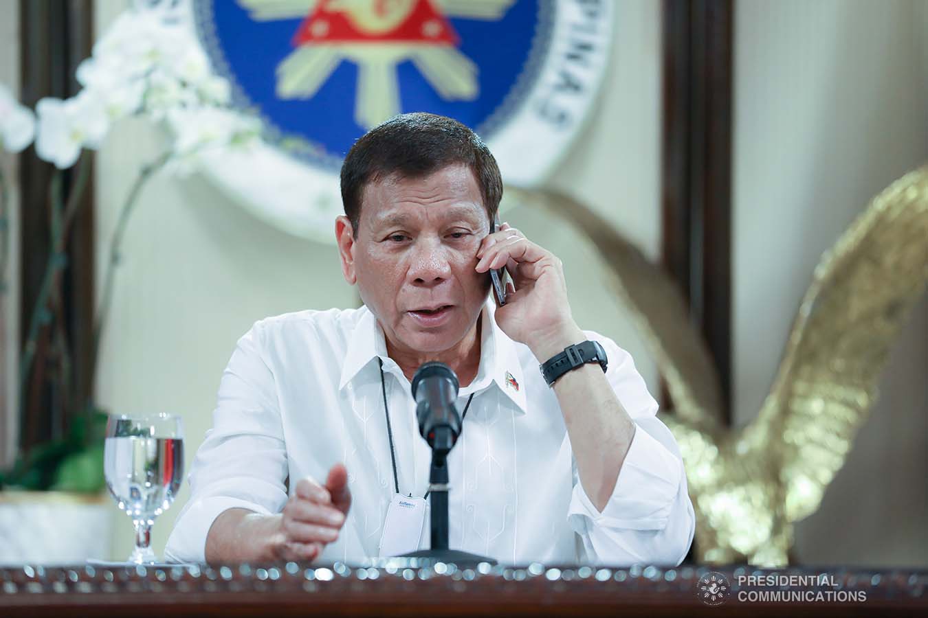 President Rodrigo Roa Duterte talks on the phone with Socialist Republic of Vietnam Prime Minister Nguyen Phuc at the Malago Clubhouse in Malacañang, Manila on May 26, 2020. KARL NORMAN ALONZO/PRESIDENTIAL PHOTO