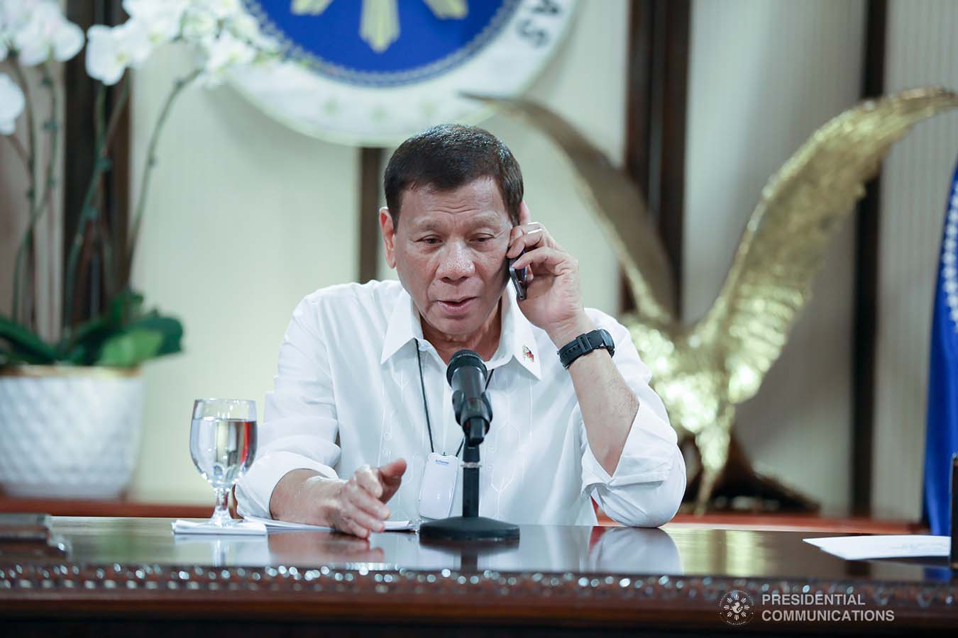 President Rodrigo Roa Duterte talks on the phone with Socialist Republic of Vietnam Prime Minister Nguyen Phuc at the Malago Clubhouse in Malacañang, Manila on May 26, 2020. KARL NORMAN ALONZO/PRESIDENTIAL PHOTO