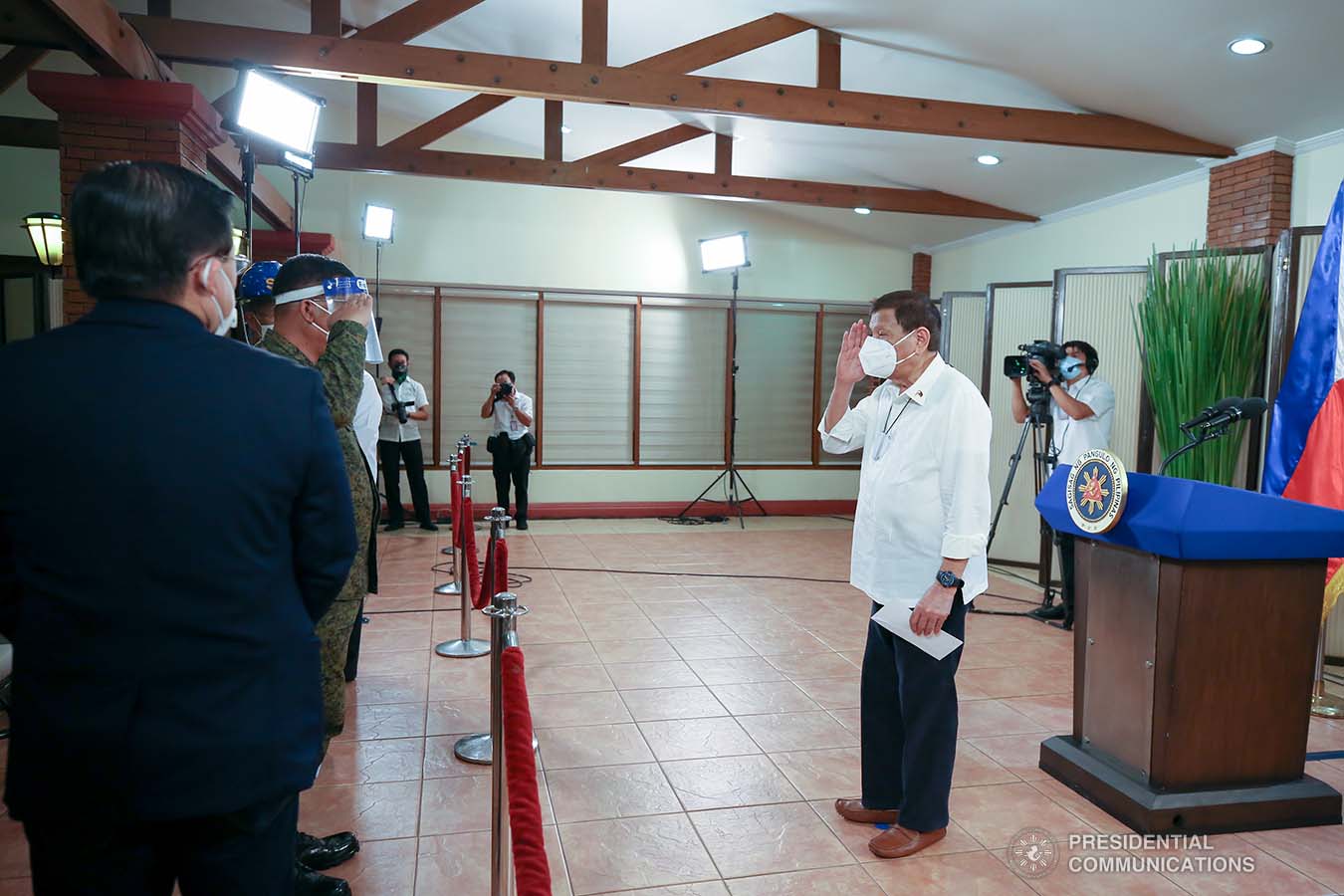 President Rodrigo Roa Duterte salutes the personnel of the Philippine Army and Philippine Air Force as he congratulates them for their successful operations against the New People's Army during a meeting at the Malago Clubhouse in Malacañang, Manila on May 26, 2020. KARL NORMAN ALONZO/PRESIDENTIAL PHOTO