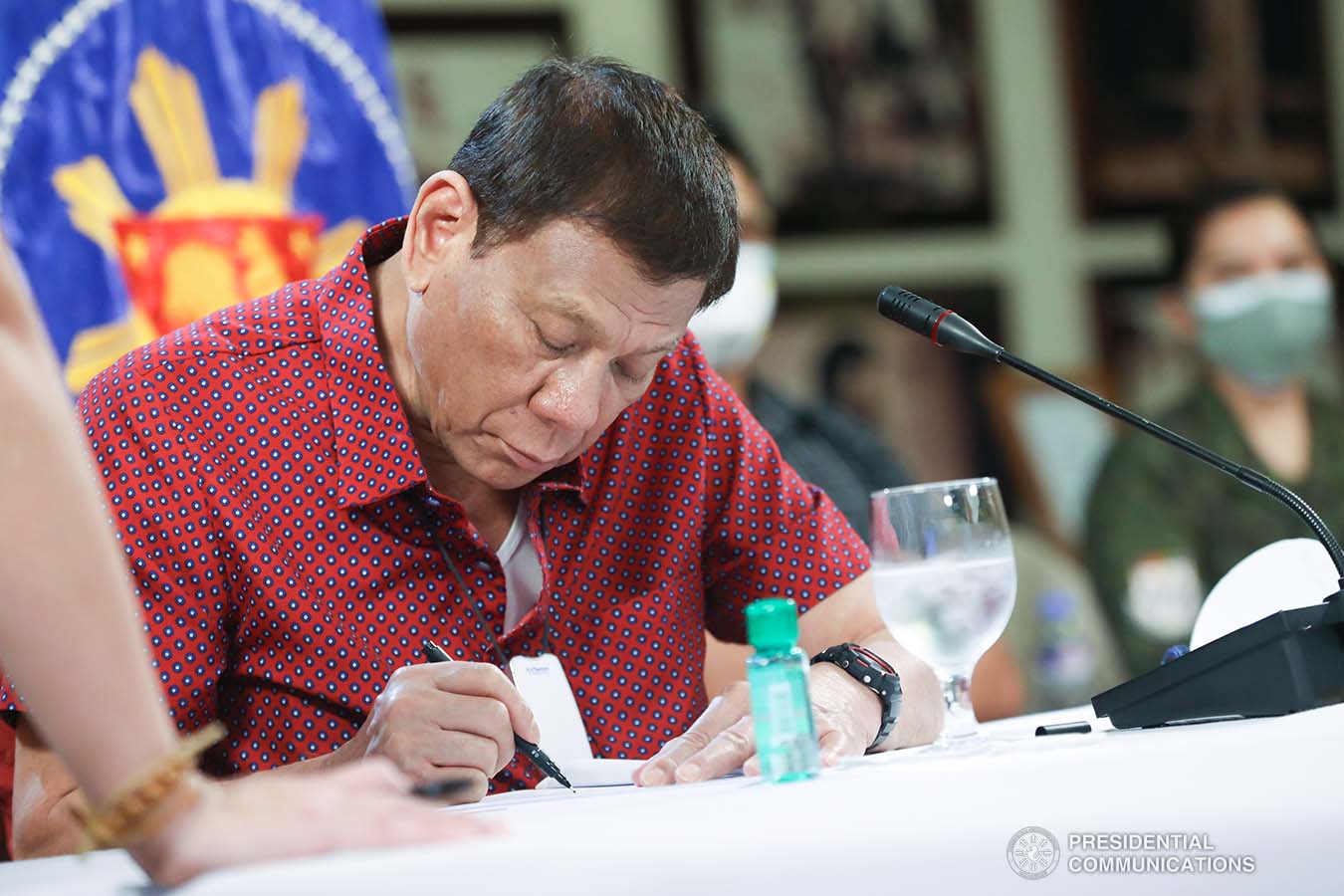 President Rodrigo Roa Duterte reviews a document while holding a meeting with members of the Inter-Agency Task Force on the Emerging Infectious Diseases (IATF-EID) at the Malago Clubhouse in Malacañang on May 28, 2020. ACE MORANDANTE/PRESIDENTIAL PHOTO