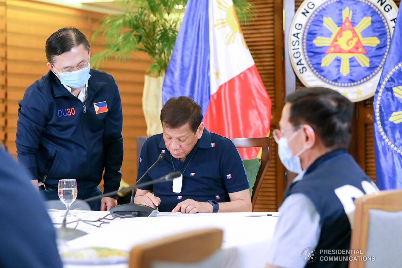 President Rodrigo Roa Duterte reviews a document during a meeting with members of the Inter-Agency Task Force on the Emerging Infectious Diseases (IATF-EID) at the Matina Enclaves in Davao City on June 4, 2020. ROBINSON NIÑAL JR./PRESIDENTIAL PHOTO