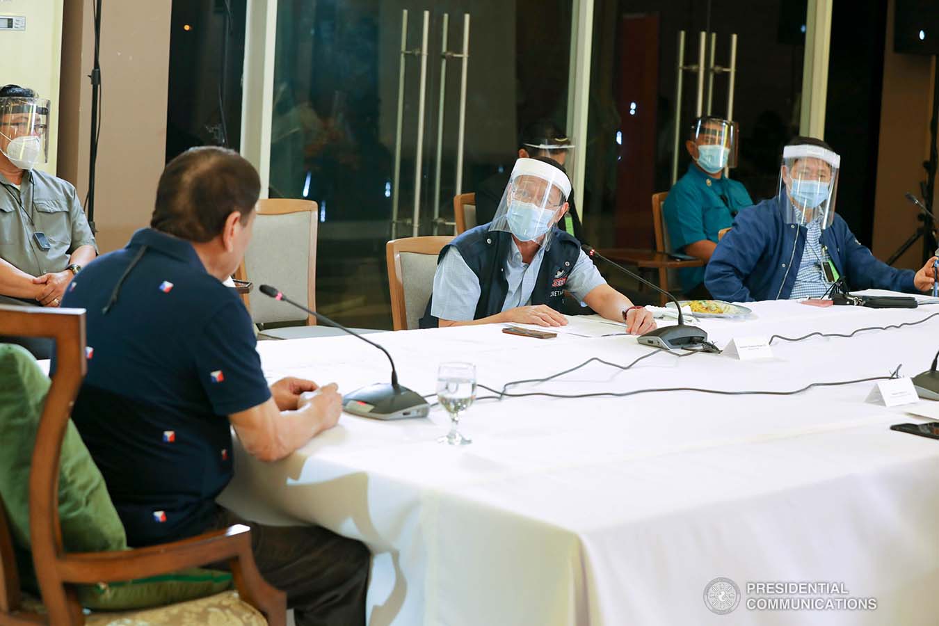 President Rodrigo Roa Duterte confers with Health Secretary Francisco Duque III during a meeting with members of the Inter-Agency Task Force on the Emerging Infectious Diseases (IATF-EID) at the Matina Enclaves in Davao City on June 4, 2020. ROBINSON NIÑAL JR./PRESIDENTIAL PHOTO