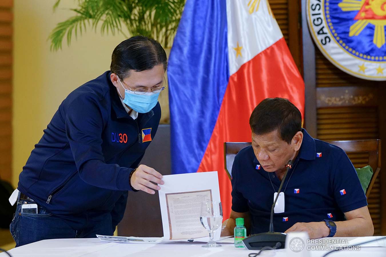 President Rodrigo Roa Duterte reviews a document during a meeting with members of the Inter-Agency Task Force on the Emerging Infectious Diseases (IATF-EID) at the Matina Enclaves in Davao City on June 4, 2020. JOEY DALUMPINES/PRESIDENTIAL PHOTO