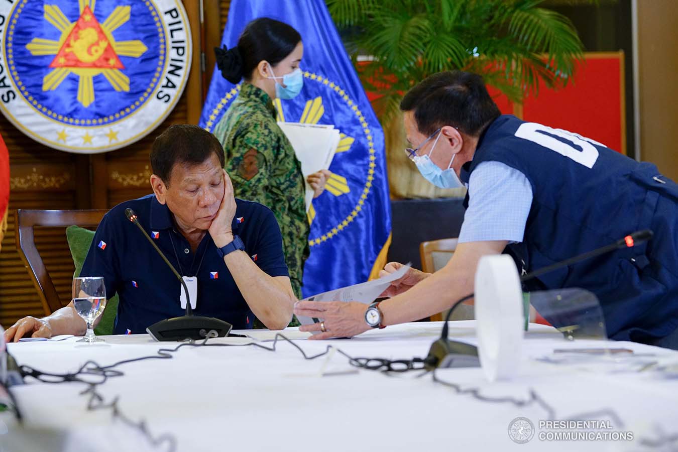 President Rodrigo Roa Duterte reviews a document during a meeting with members of the Inter-Agency Task Force on the Emerging Infectious Diseases (IATF-EID) at the Matina Enclaves in Davao City on June 4, 2020. JOEY DALUMPINES/PRESIDENTIAL PHOTO