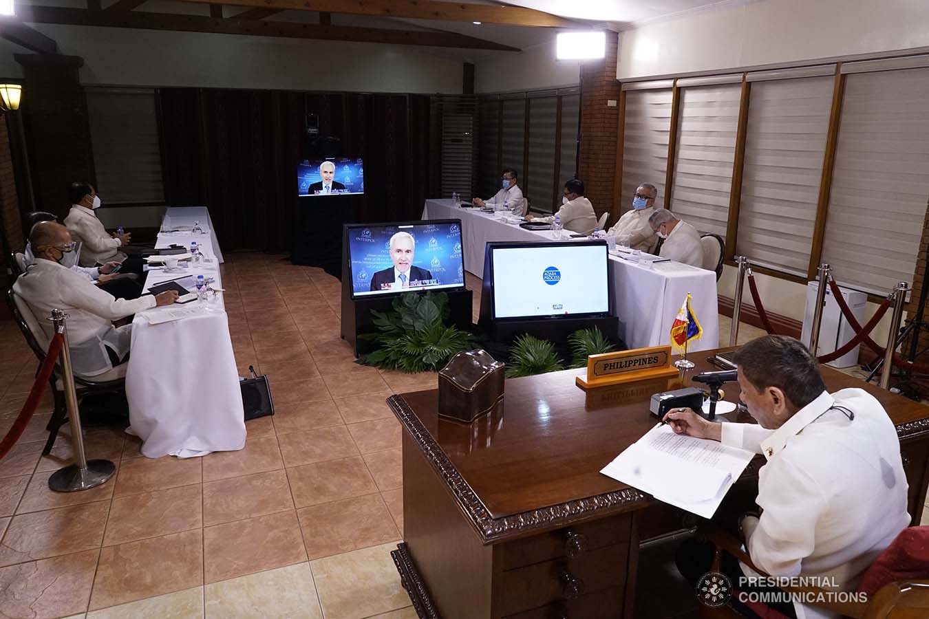 President Rodrigo Roa Duterte, together with some members of his Cabinet, and Senator Christopher Lawrence "Bong" Go listen as INTERPOL Secretary General Prof. Dr. Jürgen Stock shares his remarks during the Aqaba Process video conference at the Malago Clubhouse in Malacañang on September 2, 2020. KING RODRIGUEZ/PRESIDENTIAL PHOTOS