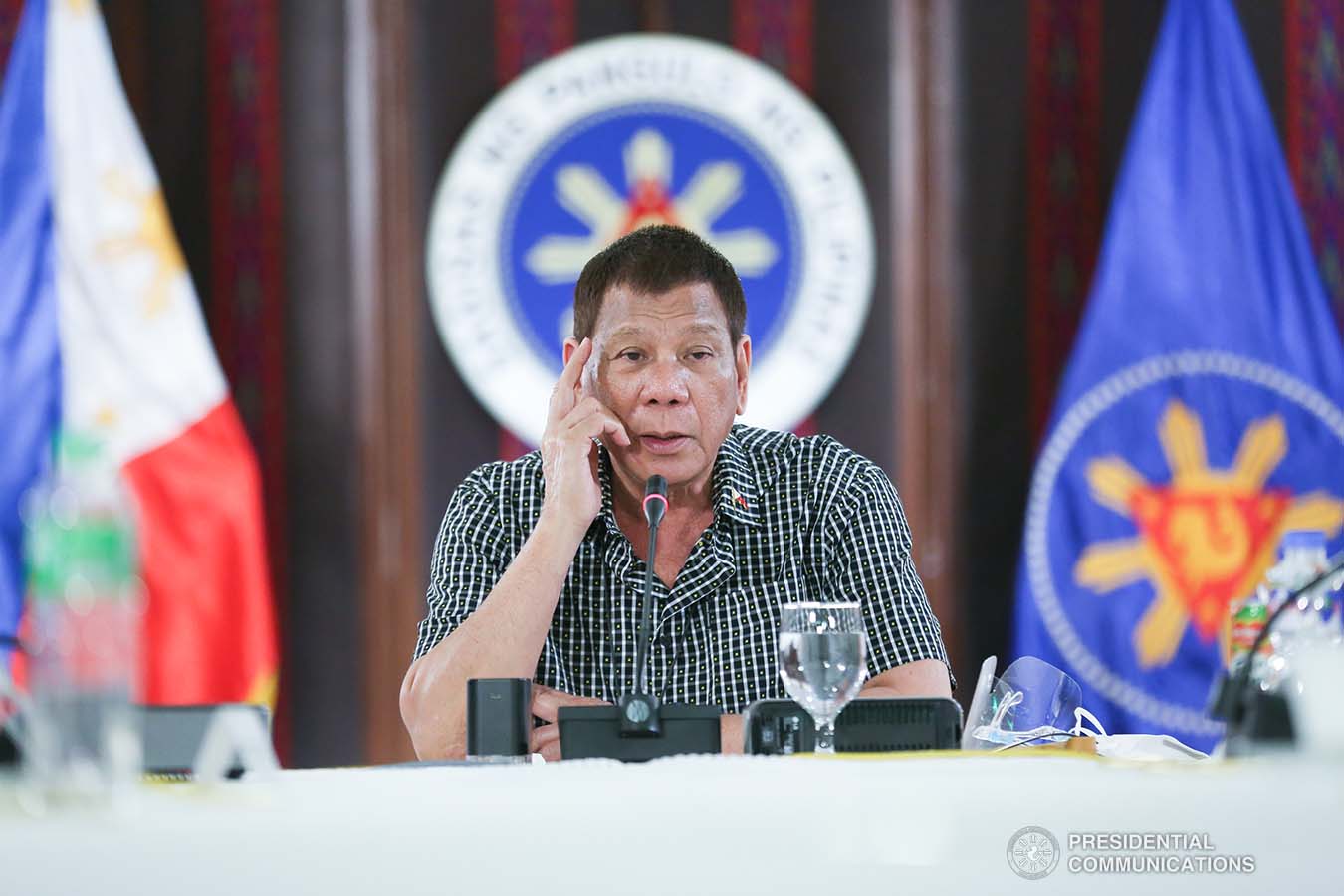 President Rodrigo Roa Duterte delivers his remarks following a meeting with the officials of the Philippine National Police and the Armed Forces of the Philippines, discussing the impasse in Congress as he called on its members to resolve the issues on the passing of the national budget for 2021 at the Malacañang Golf (Malago) Clubhouse in Malacañang Park, Manila on October 8, 2020. Joining the meeting are Executive Secretary Salvador Medialdea, Interior and Local Government Secretary Eduardo Año, and Senator Christopher "Bong" Go. ALBERTO ALCAIN/ PRESIDENTIAL PHOTO