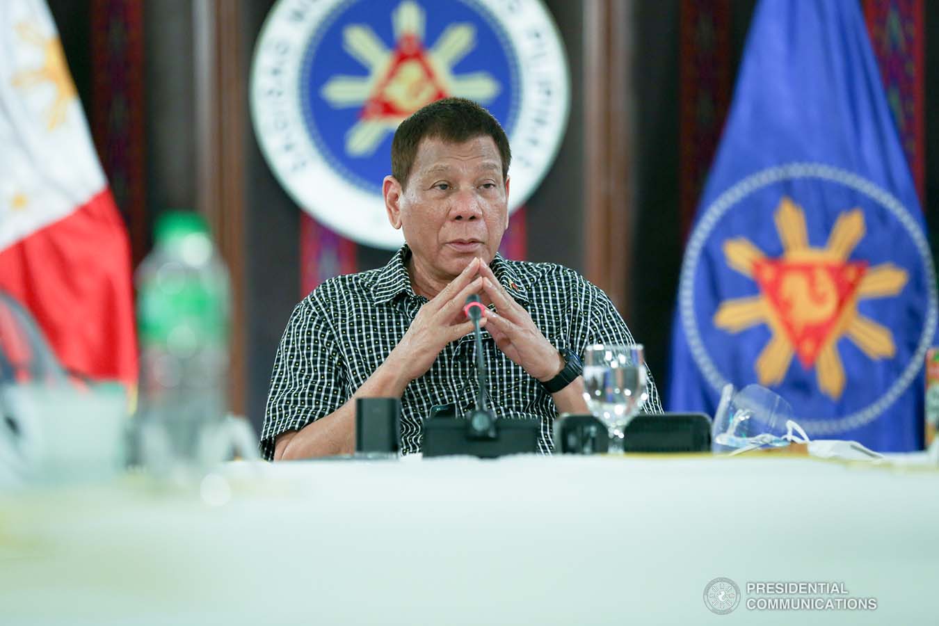 President Rodrigo Roa Duterte delivers his remarks following a meeting with the officials of the Philippine National Police and the Armed Forces of the Philippines, discussing the impasse in Congress as he called on its members to resolve the issues on the passing of the national budget for 2021 at the Malacañang Golf (Malago) Clubhouse in Malacañang Park, Manila on October 8, 2020. Joining the meeting are Executive Secretary Salvador Medialdea, Interior and Local Government Secretary Eduardo Año, and Senator Christopher "Bong" Go. SIMEON CELI/ PRESIDENTIAL PHOTO