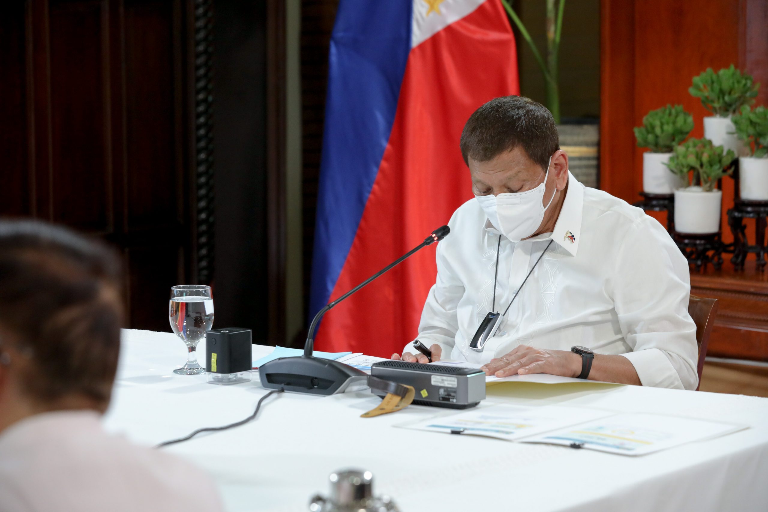 President Rodrigo Roa Duterte reviews a document prior to his talk to the people at the Malacañang Golf (Malago) Clubhouse in Malacañang Park, Manila on October 14, 2020. ROBINSON NIÑAL/ PRESIDENTIAL PHOTO