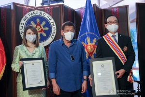 President Rodrigo Roa Duterte poses for a photo with outgoing Ambassador of Japan to the Philippines Koji Haneda and his wife, Madame Ihoko. The President conferred the Order of Sikatuna with the rank of Datu on the Japanese Ambassador who paid a farewell call on the President at the Malacañang Golf (Malago) Clubhouse in Malacañang Park, Manila on November 10, 2020. ALFRED FRIAS/PRESIDENTIAL PHOTO