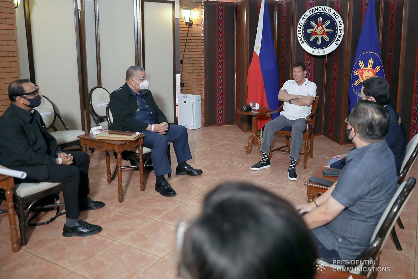 President Rodrigo Roa Duterte meets with Philippine National Police Chief Debold Menorias Sinas and Philippine Drug Enforcement Agency (PDEA) Director General Wilkins Villanueva as he orders both of them to discontinue their ongoing investigation after directing an order to the National Bureau of Investigation (NBI) to conduct a probe on the recent shootout in Commonwealth Avenue, Quezon City. The President aims to ensure impartiality on the said incident. With them during the meeting at the Malacañang Golf (Malago) Clubhouse in Malacañang Park, Manila on February 26, 2021 are Senator Christopher Lawrence Go, Justice Secretary Menardo Guevarra, Presidential Spokesperson Herminio Harry Roque Jr., and NBI Director Antonio Pagatpat. KARL NORMAN ALONZO/ PRESIDENTIAL PHOTO