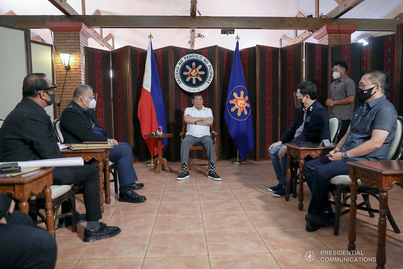President Rodrigo Roa Duterte meets with Philippine National Police Chief Debold Menorias Sinas and Philippine Drug Enforcement Agency (PDEA) Director General Wilkins Villanueva as he orders both of them to discontinue their ongoing investigation after directing an order to the National Bureau of Investigation (NBI) to conduct a probe on the recent shootout in Commonwealth Avenue, Quezon City. The President aims to ensure impartiality on the said incident. With them during the meeting at the Malacañang Golf (Malago) Clubhouse in Malacañang Park, Manila on February 26, 2021 are Senator Christopher Lawrence Go, Justice Secretary Menardo Guevarra, Presidential Spokesperson Herminio Harry Roque Jr., and NBI Director Antonio Pagatpat. KARL NORMAN ALONZO/ PRESIDENTIAL PHOTO