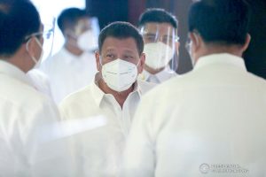 President Rodrigo Roa Duterte is greeted upon his arrival at the Malacañan Palace to attend the 51st Cabinet Meeting on February 3, 2021. SIMEON CELI/ PRESIDENTIAL PHOTO