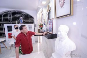 President Rodrigo Roa Duterte is accompanied by Senator Christopher Lawrence Go as he visits the resting place of his parents, Vicente Duterte, the former governor of then undivided Davao Province, and Soledad Duterte, one of Davao’s respected civic leaders, at the Roman Catholic Cemetery in Davao City, before heading to Manila, on February 21, 2021. The President consistently visits his departed loved ones even when he was still mayor of Davao City. RICHARD MADELO/ PRESIDENTIAL PHOTO