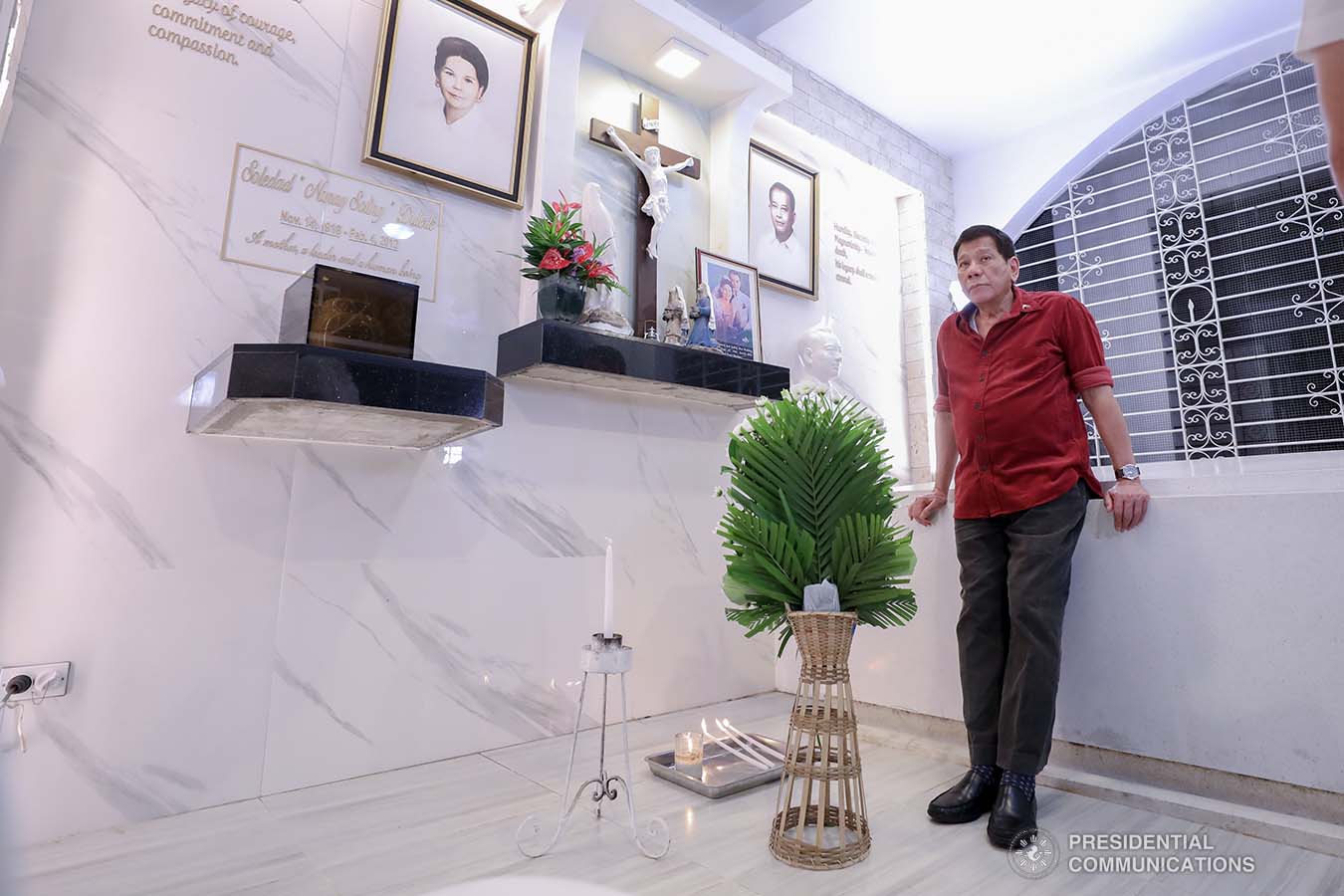 President Rodrigo Roa Duterte, before heading to Manila, visits the resting place of his parents, Vicente Duterte, the former governor of then undivided Davao Province, and Soledad Duterte, one of Davao’s respected civic leaders, at the Roman Catholic Cemetery in Davao City on February 21, 2021. The President consistently visits his departed loved ones even when he was still mayor of Davao City. RICHARD MADELO/ PRESIDENTIAL PHOTO