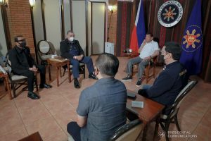 President Rodrigo Roa Duterte meets with Philippine National Police Chief Debold Menorias Sinas and Philippine Drug Enforcement Agency (PDEA) Director General Wilkins Villanueva as he orders both of them to discontinue their ongoing investigation after directing an order to the National Bureau of Investigation (NBI) to conduct a probe on the recent shootout in Commonwealth Avenue, Quezon City. The President aims to ensure impartiality on the said incident. With them during the meeting at the Malacañang Golf (Malago) Clubhouse in Malacañang Park, Manila on February 26, 2021 are Senator Christopher Lawrence Go, Justice Secretary Menardo Guevarra, Presidential Spokesperson Herminio Harry Roque Jr., and NBI Director Antonio Pagatpat. ACE MORANDANTE/ PRESIDENTIAL PHOTO