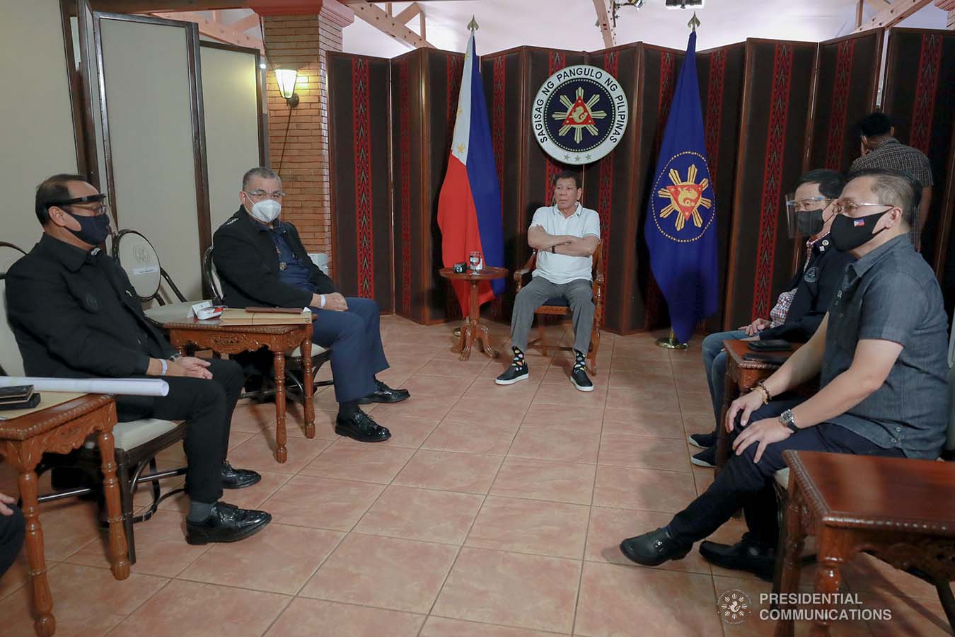 President Rodrigo Roa Duterte meets with Philippine National Police Chief Debold Menorias Sinas and Philippine Drug Enforcement Agency (PDEA) Director General Wilkins Villanueva as he orders both of them to discontinue their ongoing investigation after directing an order to the National Bureau of Investigation (NBI) to conduct a probe on the recent shootout in Commonwealth Avenue, Quezon City. The President aims to ensure impartiality on the said incident. With them during the meeting at the Malacañang Golf (Malago) Clubhouse in Malacañang Park, Manila on February 26, 2021 are Senator Christopher Lawrence Go, Justice Secretary Menardo Guevarra, Presidential Spokesperson Herminio Harry Roque Jr., and NBI Director Antonio Pagatpat. ACE MORANDANTE/ PRESIDENTIAL PHOTO