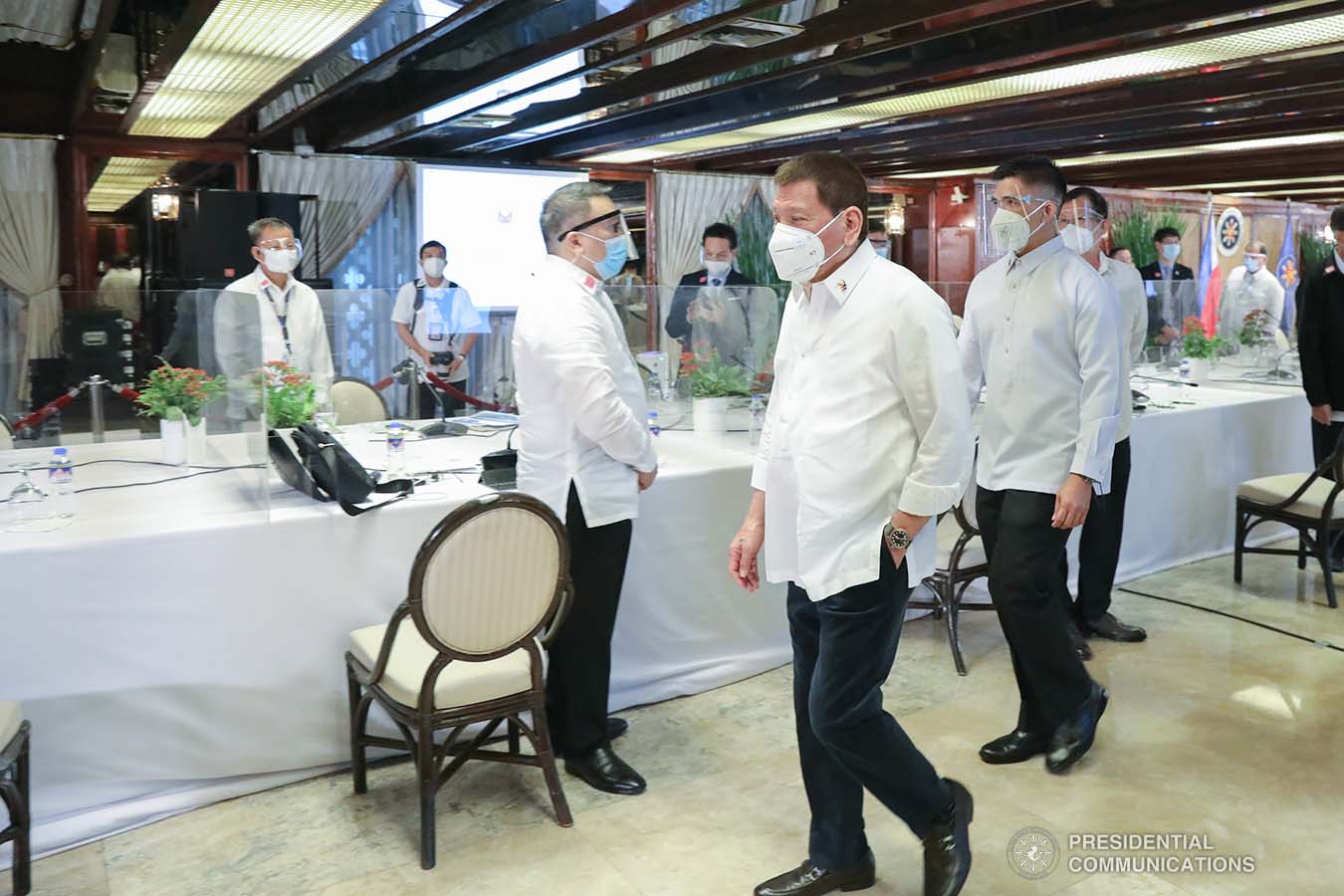 President Rodrigo Roa Duterte walks past the attendees of the 51st Cabinet Meeting upon his arrival at the Malacañan Palace on February 3, 2021. ROBINSON NIÑAL/ PRESIDENTIAL PHOTO