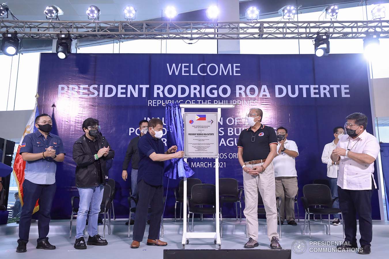 President Rodrigo Roa Duterte leads the unveiling of the marker of the Port Operations Building at the Port of Dumaguete in Dumaguete City, Negros Oriental on March 11, 2021. The President was assisted by Senator Christopher Lawrence Go, Transportation Secretary Arthur Tugade, Presidential Assistant for the Visayas Secretary Michael Lloyd Dino, and Philippine Ports Authority General Manager Jay Daniel Santiago. ACE MORANDANTE/ PRESIDENTIAL PHOTO