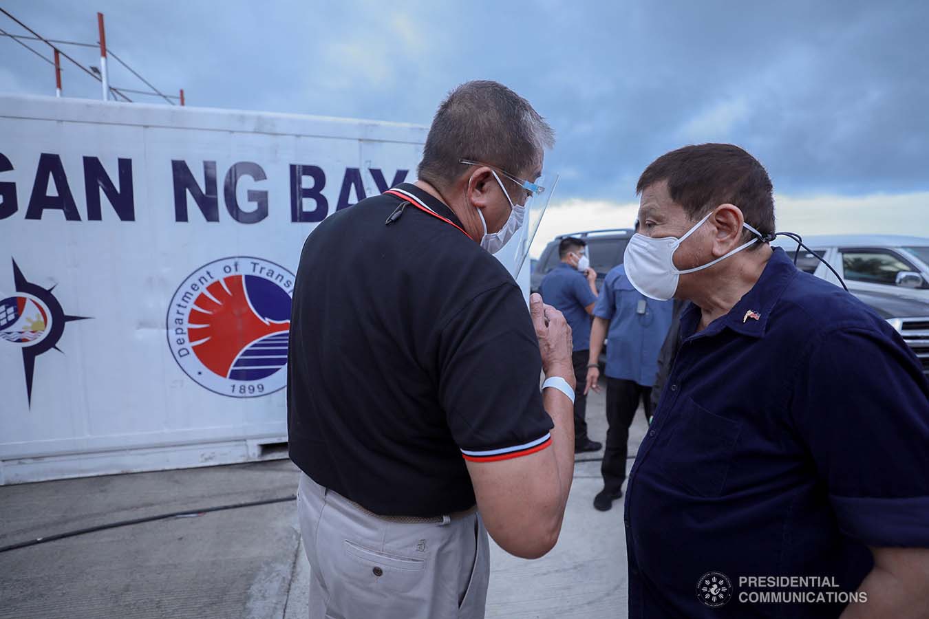President Rodrigo Roa Duterte discusses matters with Transportation Secretary Arthur Tugade after leading the inauguration of the Port Operations Building at the Port of Dumaguete in Dumaguete City, Negros Oriental on March 11, 2021. ACE MORANDANTE/ PRESIDENTIAL PHOTO