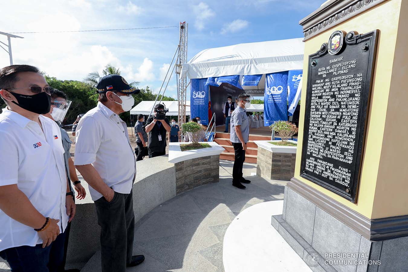 President Rodrigo Roa Duterte, accompanied by Senator Christopher Lawrence Go, looks at the Quincentennial Marker after unveiling it during his attendance in the 500th Anniversary of the Philippine Part in the First Circumnavigation of the World held at the Veterans Park Calicaon Island in Guiuan, Eastern Samar  on March 18, 2021. ACE MORANDANTE/ PRESIDENTIAL PHOTO