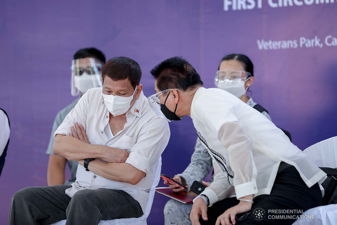 President Rodrigo Roa Duterte discusses matters with Chief Presidential Legal Counsel Salvador Panelo during the 500th Anniversary of the Philippine Part in the First Circumnavigation of the World held at the Veterans Park Calicoan Island in Guiuan, Eastern Samar  on March 18, 2021. ACE MORANDANTE/ PRESIDENTIAL PHOTO