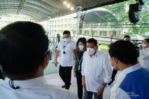 President Rodrigo Roa Duterte interacts with local officials during the inauguration of the newly constructed Gen. Gregorio H. Del Pilar Integrated School and Virginia Ramirez-Cruz High School buildings in Bulakan, Bulacan on March 4, 2021. KING RODRIGUEZ/ PRESIDENTIAL PHOTO