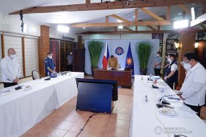 President Rodrigo Roa Duterte together with his Cabinet members bow their heads in prayer for the departed soul of Presidential Legislative Liaison Secretary Adelino Sitoy who succumbed to Covid-19 during the meeting with the Inter-Agency Task Force on the Emerging Infectious Diseases (IATF-EID) core members at the Malacañang Golf (Malago) Clubhouse in Malacañang Park, Manila on April 15, 2021. KING RODRIGUEZ/ PRESIDENTIAL PHOTO