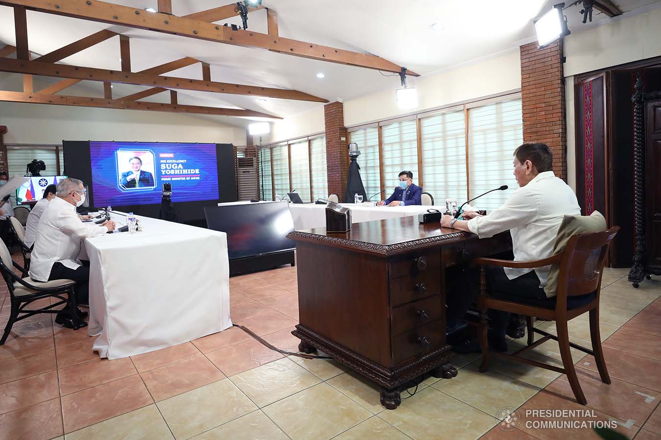 President Rodrigo Roa Duterte and Japan Prime Minister Yoshihide Suga discuss matters during a phone call at the Malacañang Golf (Malago) Clubhouse in Malacañang Park, Manila on May 19, 2021. RICHARD MADELO/ PRESIDENTIAL PHOTO