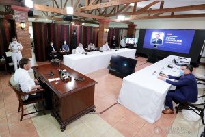President Rodrigo Roa Duterte and Japan Prime Minister Yoshihide Suga discuss matters during a phone call at the Malacañang Golf (Malago) Clubhouse in Malacañang Park, Manila on May 19, 2021. ROBINSON NIÑAL/ PRESIDENTIAL PHOTO
