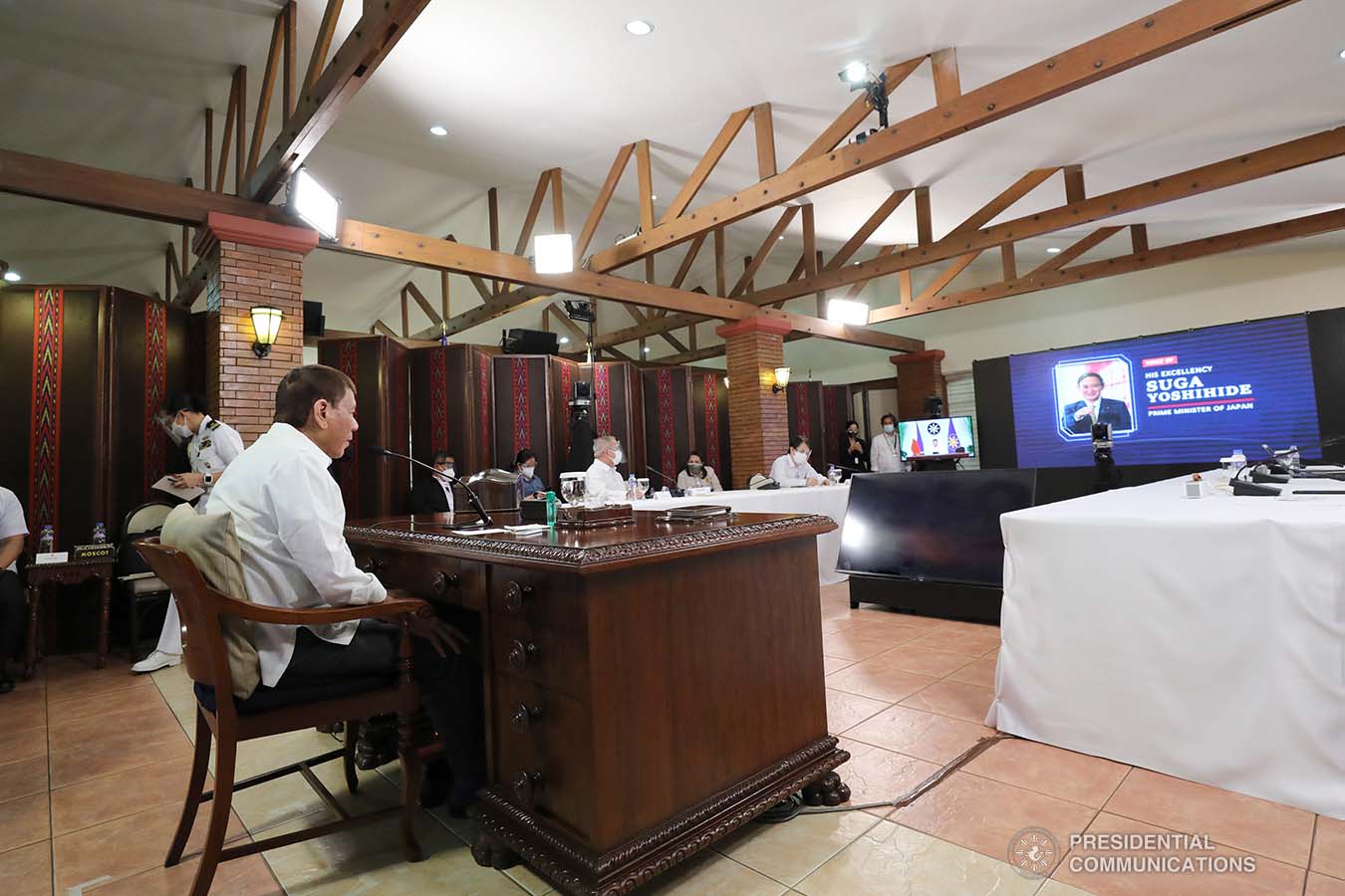 President Rodrigo Roa Duterte and Japan Prime Minister Yoshihide Suga discuss matters during a phone call at the Malacañang Golf (Malago) Clubhouse in Malacañang Park, Manila on May 19, 2021. ROBINSON NIÑAL/ PRESIDENTIAL PHOTO