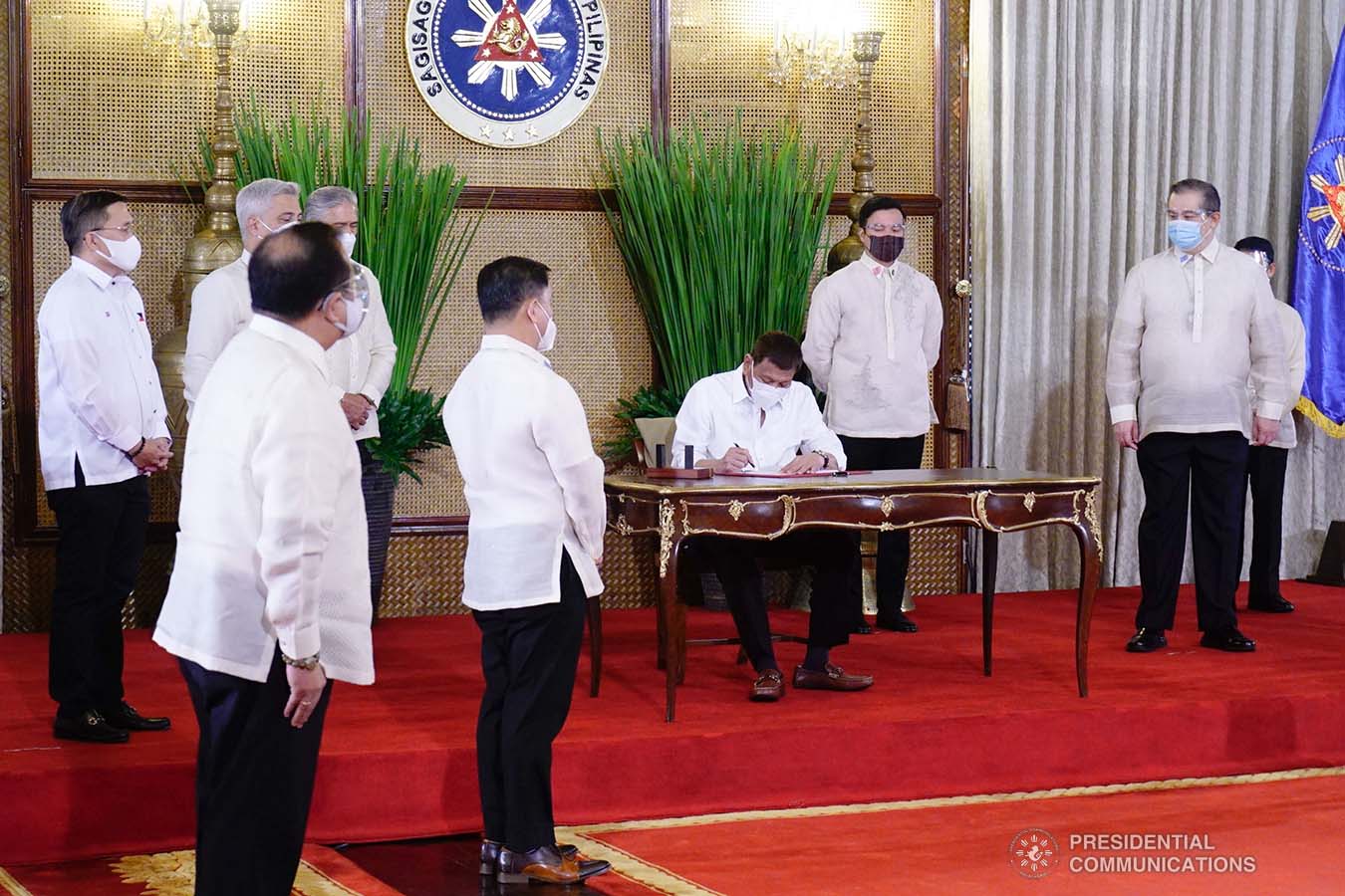 President Rodrigo Roa Duterte leads the re-enactment of the signing of several bills held at the Malacañang Palace on June 16, 2021. ARMAN BAYLON/ PRESIDENTIAL PHOTO