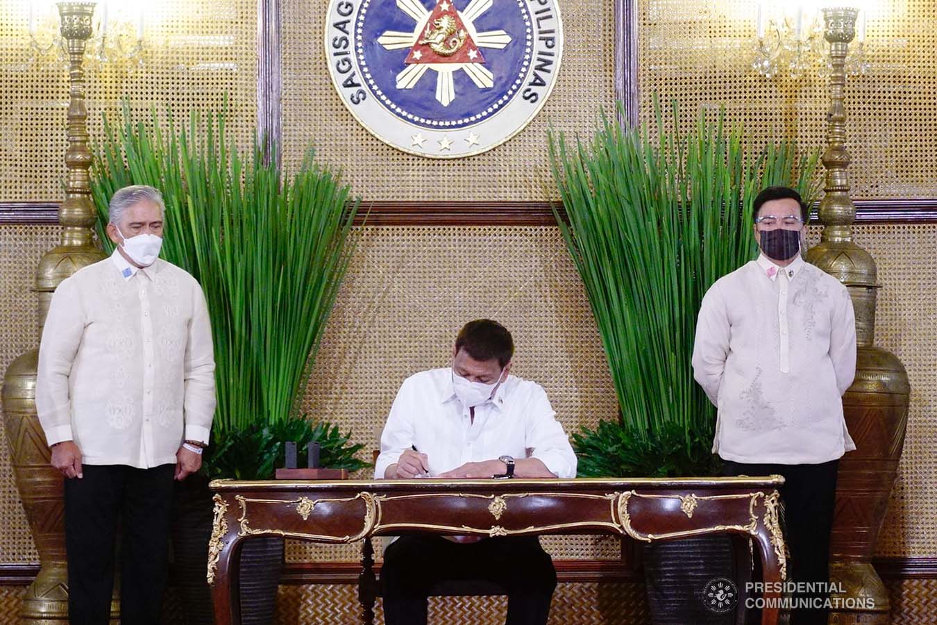 President Rodrigo Roa Duterte leads the re-enactment of the signing of several bills held at the Malacañang Palace on June 16, 2021. ARMAN BAYLON/ PRESIDENTIAL PHOTO