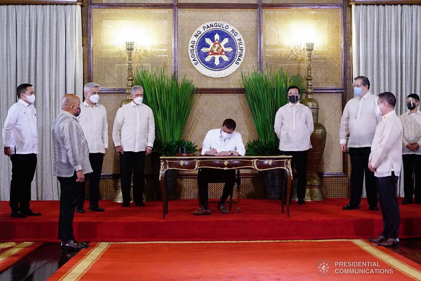 President Rodrigo Roa Duterte leads the re-enactment of the signing of several bills held at the Malacañang Palace on June 16, 2021. ARMAN BAYLON/ PRESIDENTIAL PHOTO