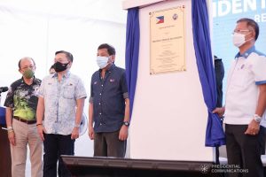 President Rodrigo Roa Duterte unveils the project marker, to signify the inauguration of the 7.42-kilometers Sariaya Bypass Road in Barangay Isabang, Lucena City, Quezon on October 21, 2021. SIMEON CELI/ PRESIDENTIAL PHOTO