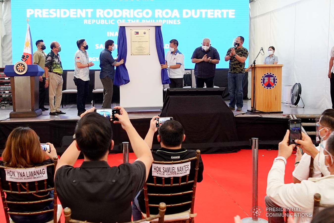 President Rodrigo Roa Duterte unveils the project marker, to signify the inauguration of the 7.42-kilometers Sariaya Bypass Road in Barangay Isabang, Lucena City, Quezon on October 21, 2021. With the President are (from left) Quezon Governor Danilo Suarez, Senator Christopher Lawrence Go, Public Works and Highways Acting Secretary Roger Mercado, Executive Secretary Salvador Medialdea, and Quezon District 2 Representative David Suarez. KING RODRIGUEZ/ PRESIDENTIAL PHOTO