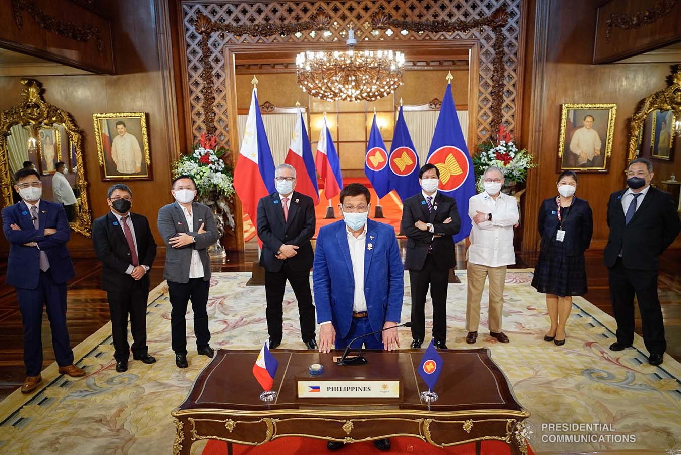 President Rodrigo Roa Duterte poses for a photo opportunity with Senator Christopher Lawrence Go, some of his Cabinet members and representatives from various government agencies in attendance following the virtual 38th and 39th Association of Southeast Asian Nations (ASEAN) Summits and Related Summits hosted by Brunei Darussalam at the Malacañang Palace on October 28, 2021. KING RODRIGUEZ/ PRESIDENTIAL PHOTO