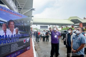 President Rodrigo Roa Duterte, accompanied by Senator Christopher Lawrence "Bong" Go and Transportation Secretary Arthur Tugade, inspects the facilities of the newly constructed Malasakit Hall at the Zamboanga International Airport in Zamboanga City on December 2, 2021. TOTO LOZANO/ PRESIDENTIAL PHOTO