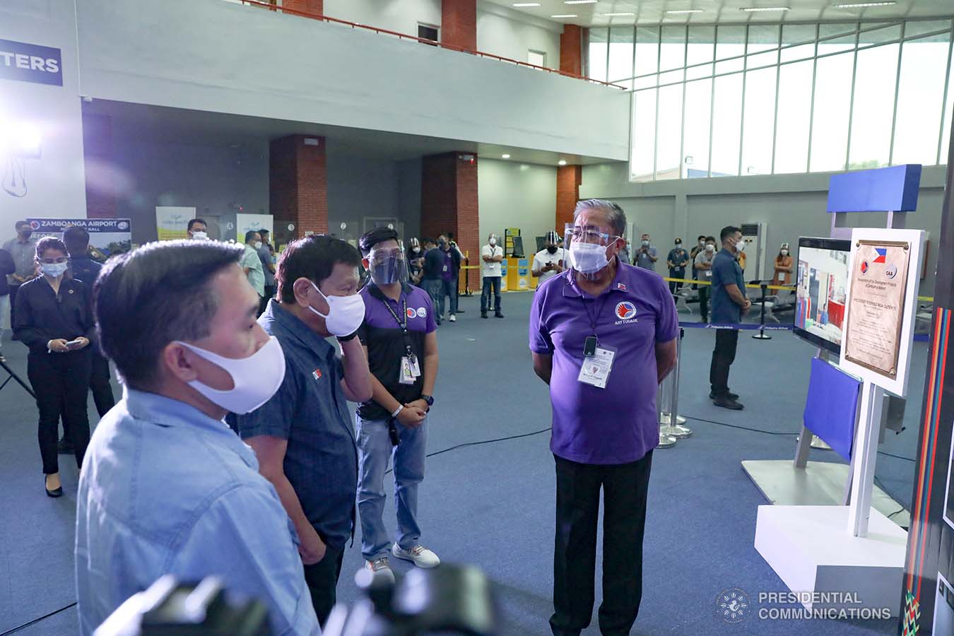 President Rodrigo Roa Duterte, accompanied by Senator Christopher Lawrence "Bong" Go, is apprised by Transportation Secretary Arthur Tugade about the development projects of the Zamboanga International Airport during an inspection at the airport in Zamboanga City on December 2, 2021. TOTO LOZANO/ PRESIDENTIAL 