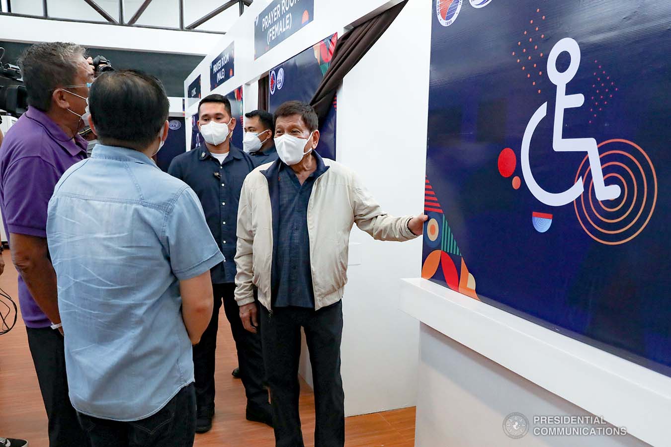 President Rodrigo Roa Duterte, accompanied by Senator Christopher Lawrence "Bong" Go and Transportation Secretary Arthur Tugade, inspects the facilities of the newly constructed Malasakit Hall at the Zamboanga International Airport in Zamboanga City on December 2, 2021. TOTO LOZANO/ PRESIDENTIAL PHOTO